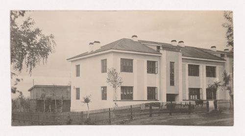 Exterior view of a two-storey house, Leninsk-Kuznetskiy, Soviet Union (now in Russia)