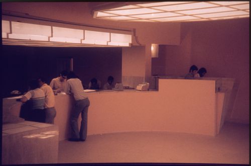 View of people and interior of Banco Pinto & Sotto Mayor, agência e clube, Lamego, Portugal