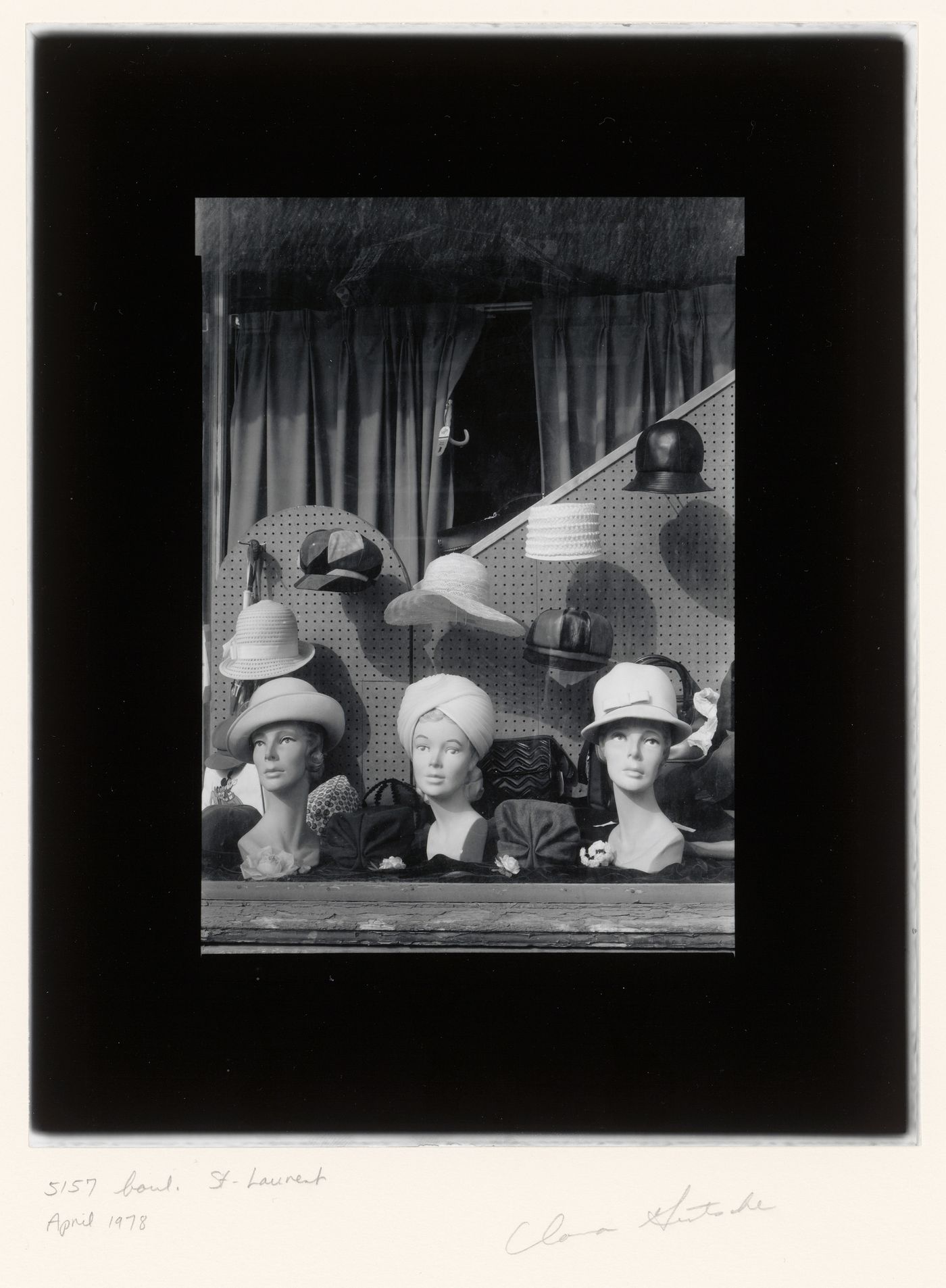 View of a display window of the hat boutique at 5157 boulevard Saint-Laurent, Montréal, Québec