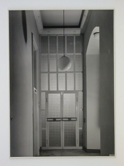 Interior view of a corridor and entrances in a building designed by Josef Franz Maria Hoffmann