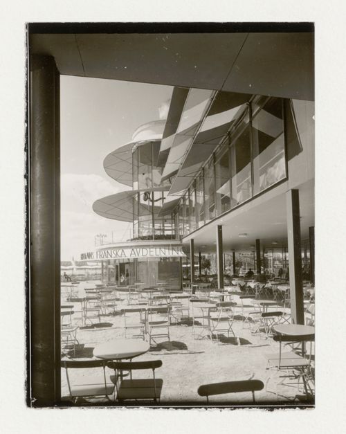 View of the lateral façade of Paradise Restaurant at the Stockholm Exhibition of 1930 showing the terrace with tables and chairs, Stockholm