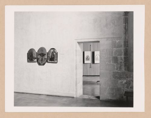 Interior view of a gallery showing a triptych painting, a doorway and another gallery, Palazzo Abatellis, Galleria regionale della Sicilia, Palermo, Italy