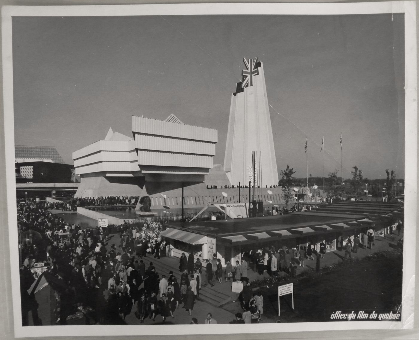 View of the Pavilion of Great Britain with boutiques in foreground, Expo 67, Montréal, Québec