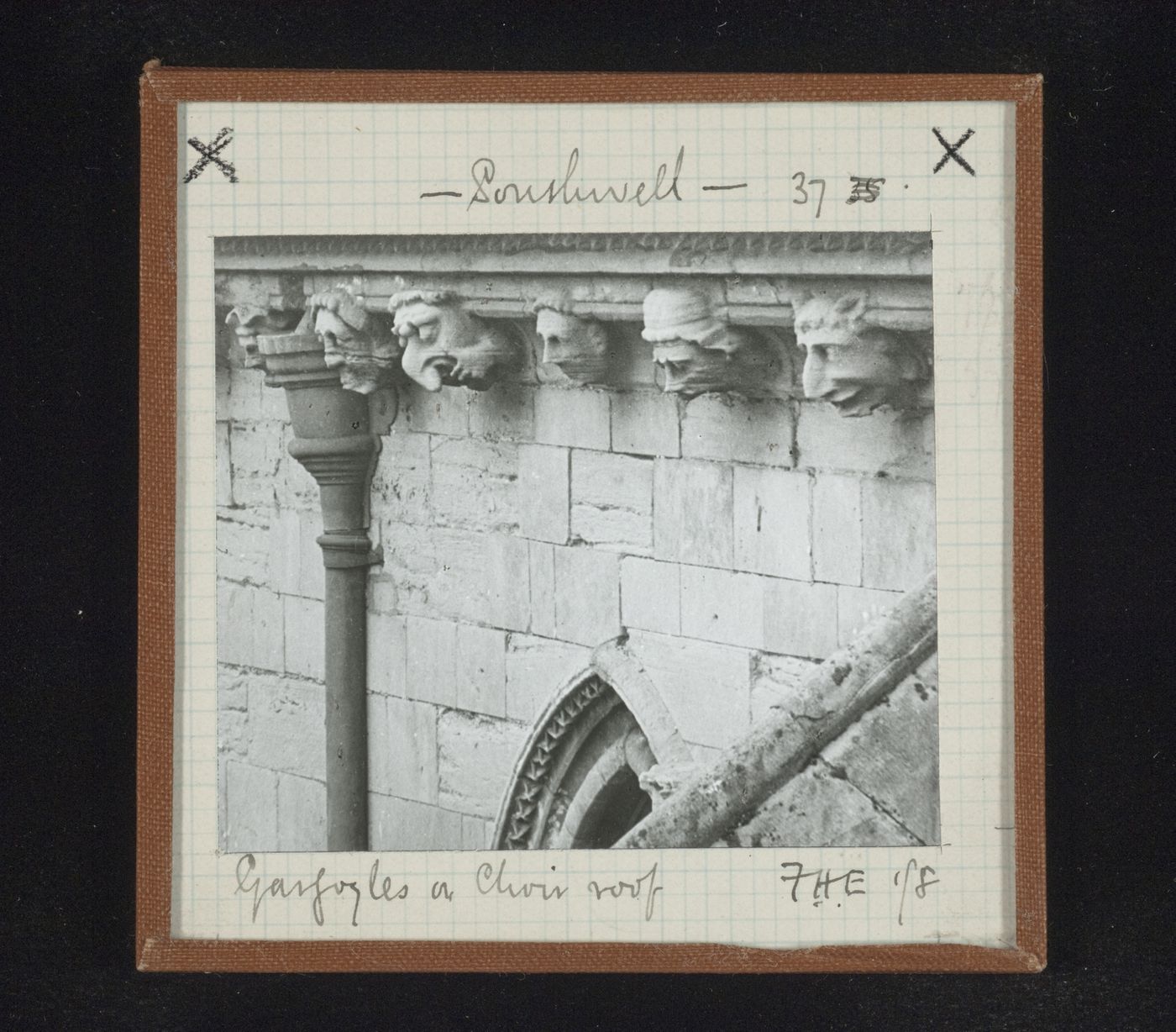 Detail view of sculptures of grotesque heads on choir roof, Southwell Minster, Southwell, Nottinghamshire, England