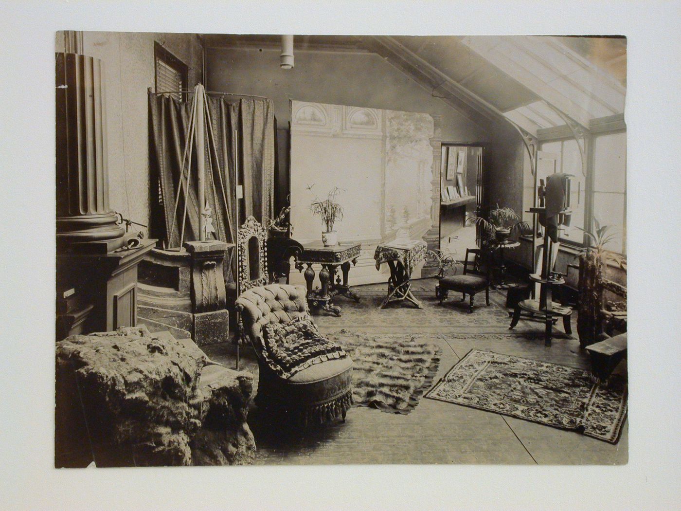 Interior view of a photographic studio showing props for commercial portraiture, possibly in Derbyshire, England