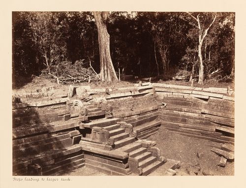 View of a staircase leading into a water tank, Kuttam Pokuna [Twin Ponds], Anuradhapura, Ceylon (now Sri Lanka)