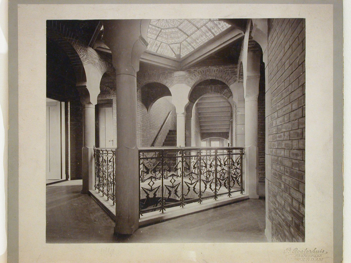 Interior view of Huis [House] Carel Henny showing the iron railing around the light well on the first floor landing with the skylight above, Oude Scheveningseweg 42, The Hague, Netherlands