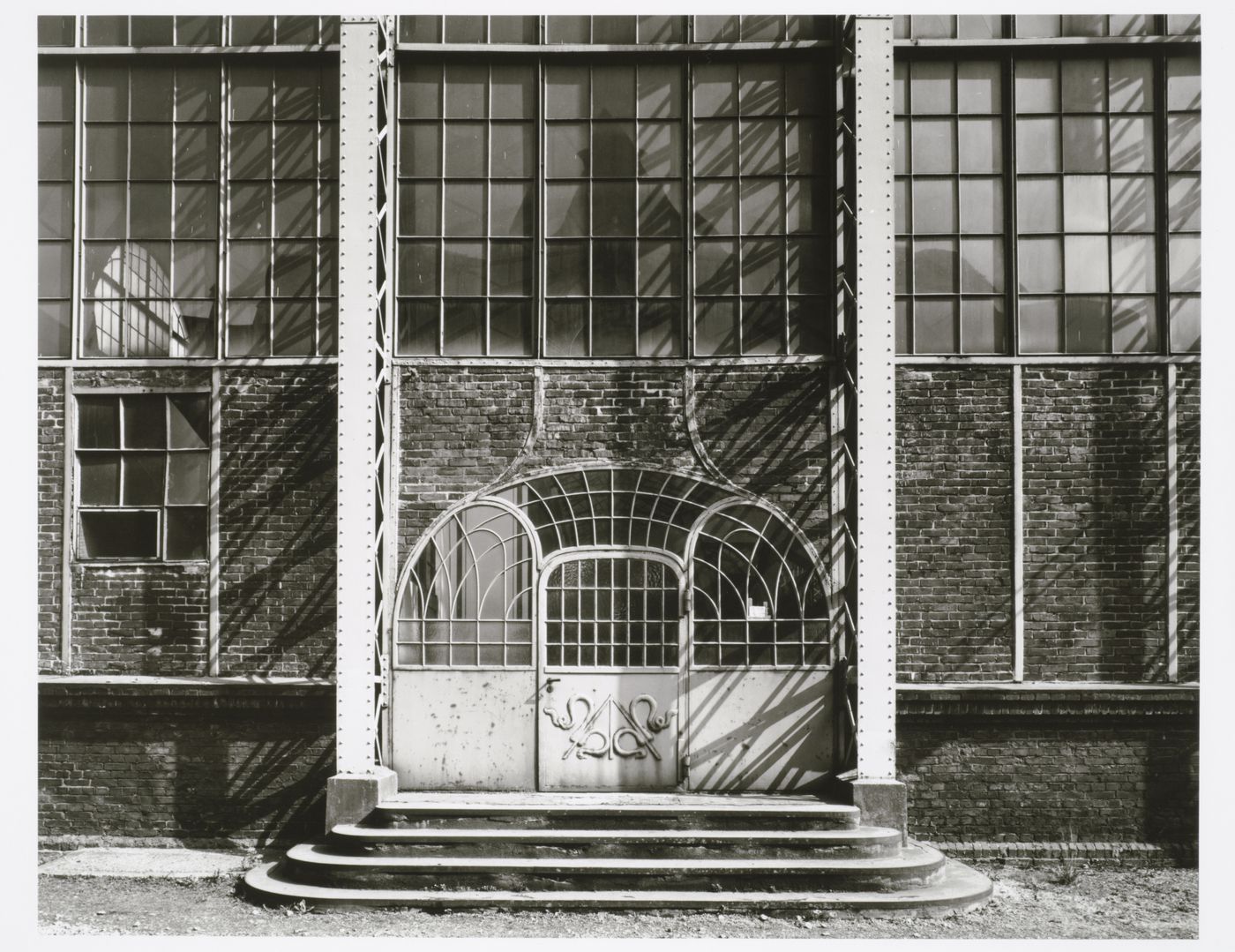 View of an entrance to the turbine building of Zeche Zollern 2 [Colliery Zollern 2] (now the Westphalian Industrial Museum) showing decorative ironwork, Bövinghausen, Dortmund, Germany
