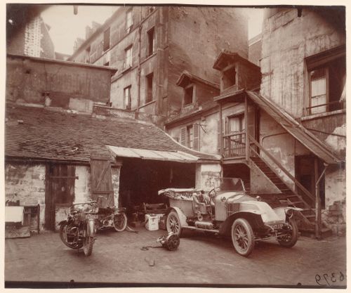 Car, motorcycle, and garage, Cour, Rue de Valence, Paris, France