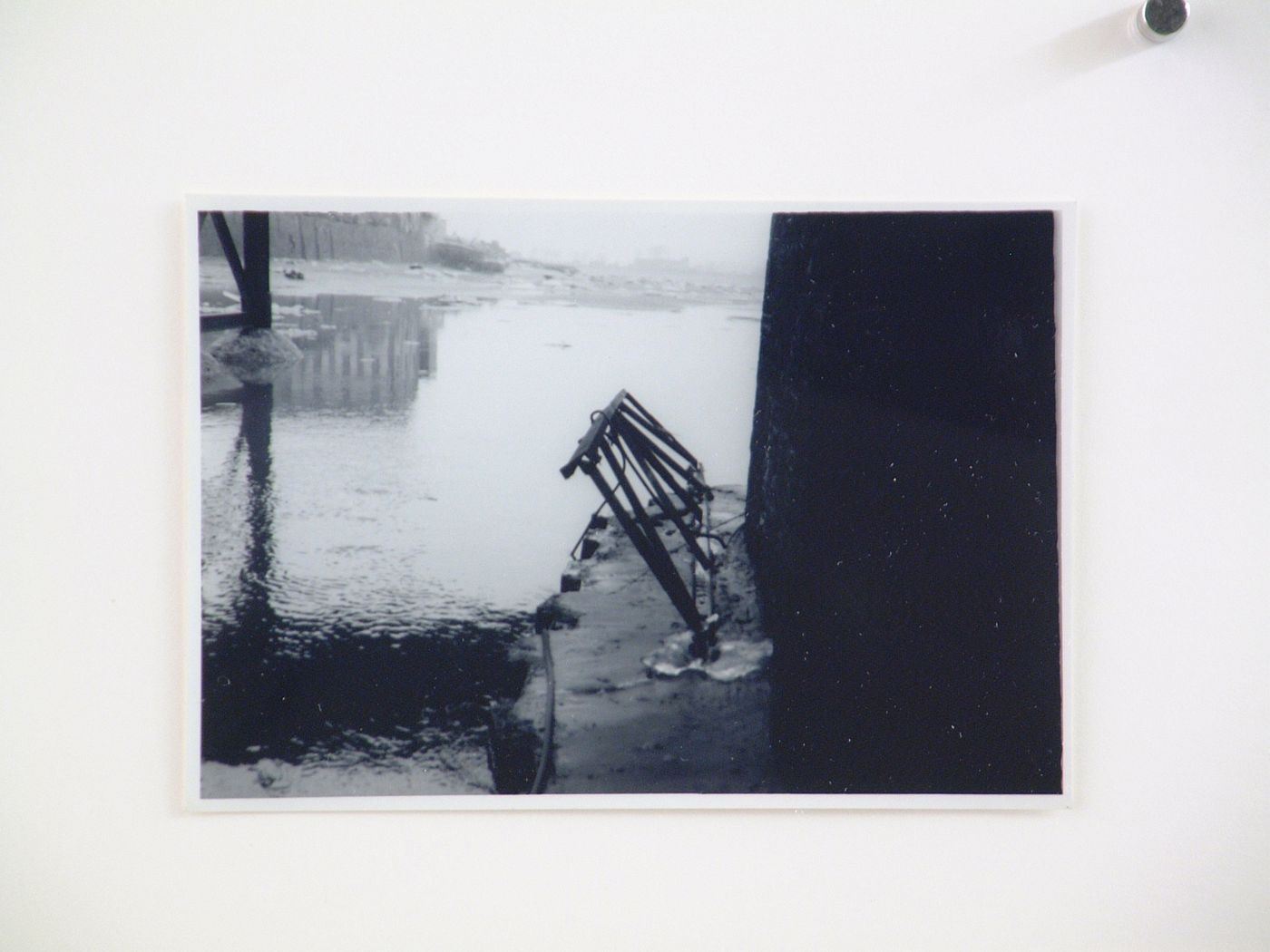 View of steel beams below bridge arch