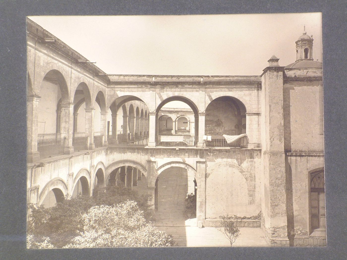 View of the patios del Departamento mayor of the Colegio de las Vizcaínas with the dome over the principal stairs in the background, Mexico City, Mexico