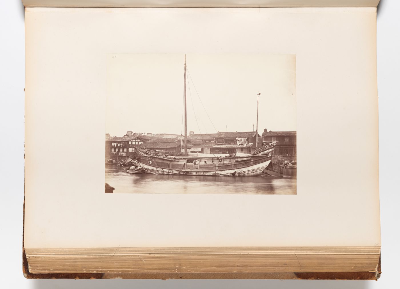 View of a junk and houses on the Pearl River (also known as the Canton River, now Zhujiang), Canton (now Guangzhou), China