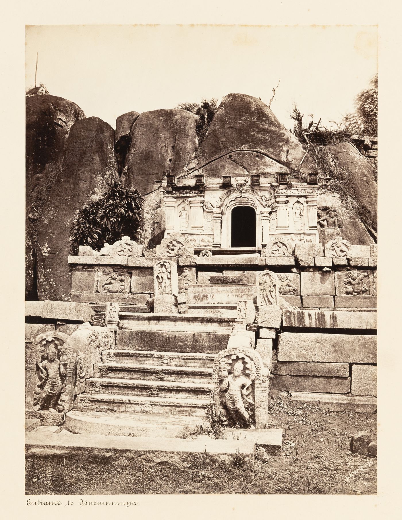 View of the staircase and portico, Isurumuniya Temple, Anuradhapura, Ceylon (now Sri Lanka)