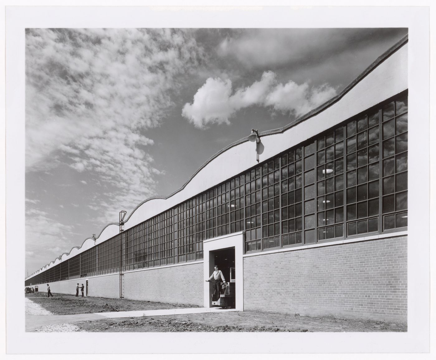 View of the principal façade of the Machine Shop Department of the Automobile Assembly Building (also known as Building No. 4), Dodge Chicago Plant, Chrysler Corporation Dodge division, Chicago, Illinois