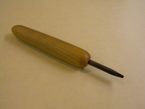 Fleuron emmanché (motif triangulaire)