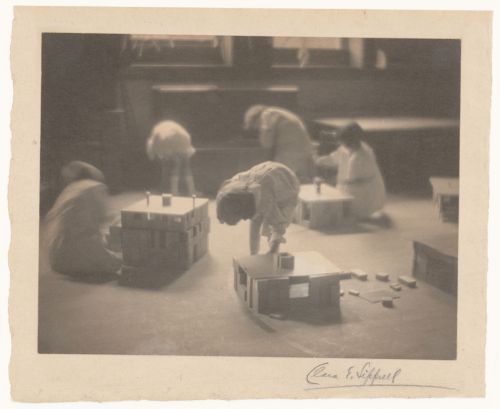 Interior view showing children playing with building blocks