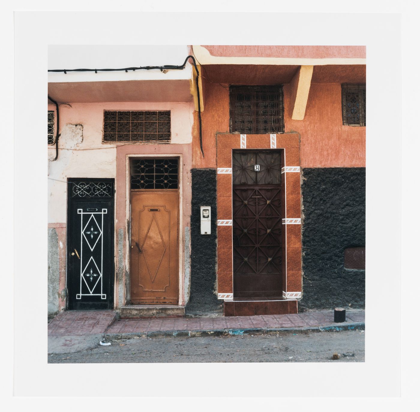 Decorated doors of buildings, cité horizontale, Carrières centrales neighbourhood, Casablanca