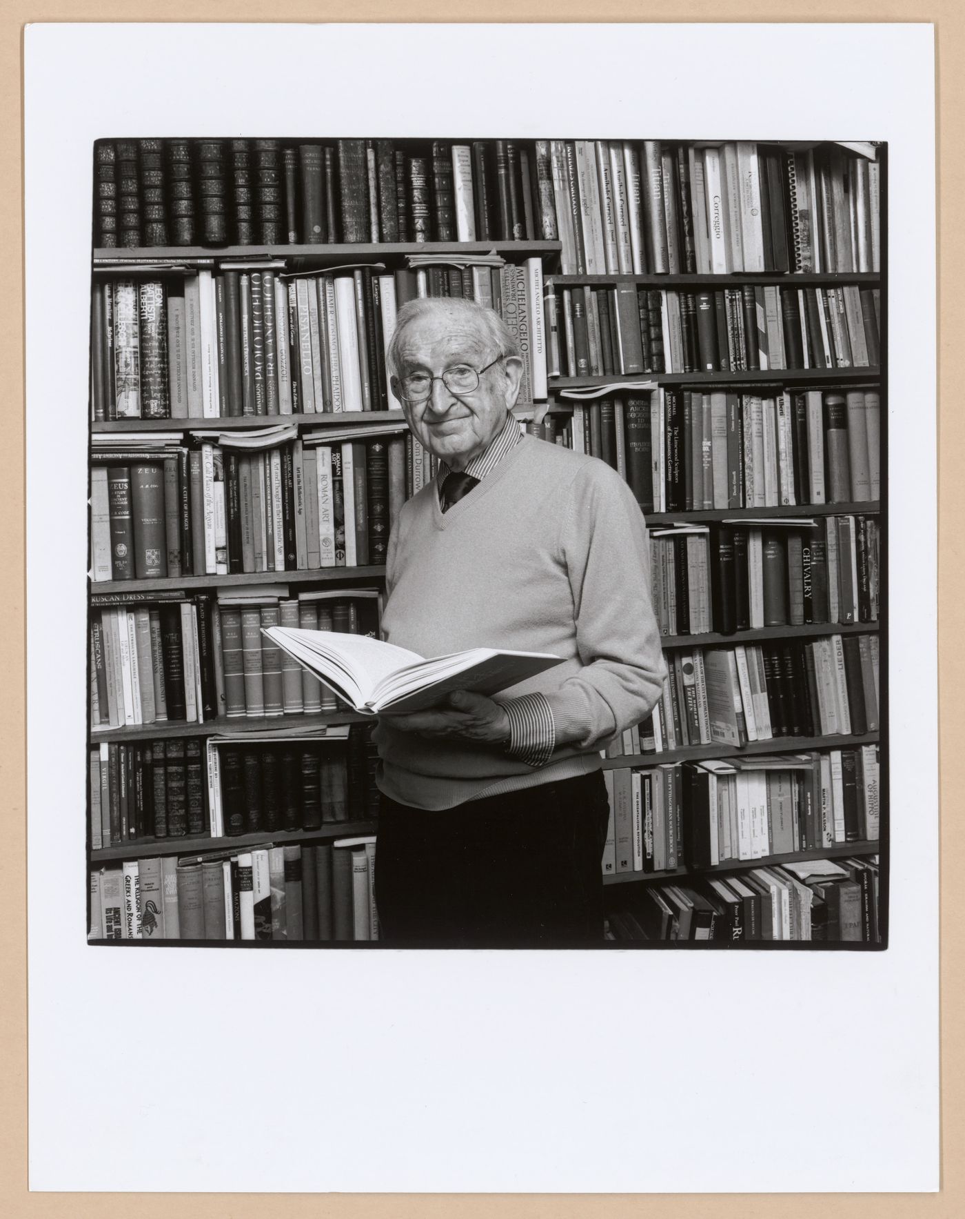 Portrait of Joseph Rykwert in his library