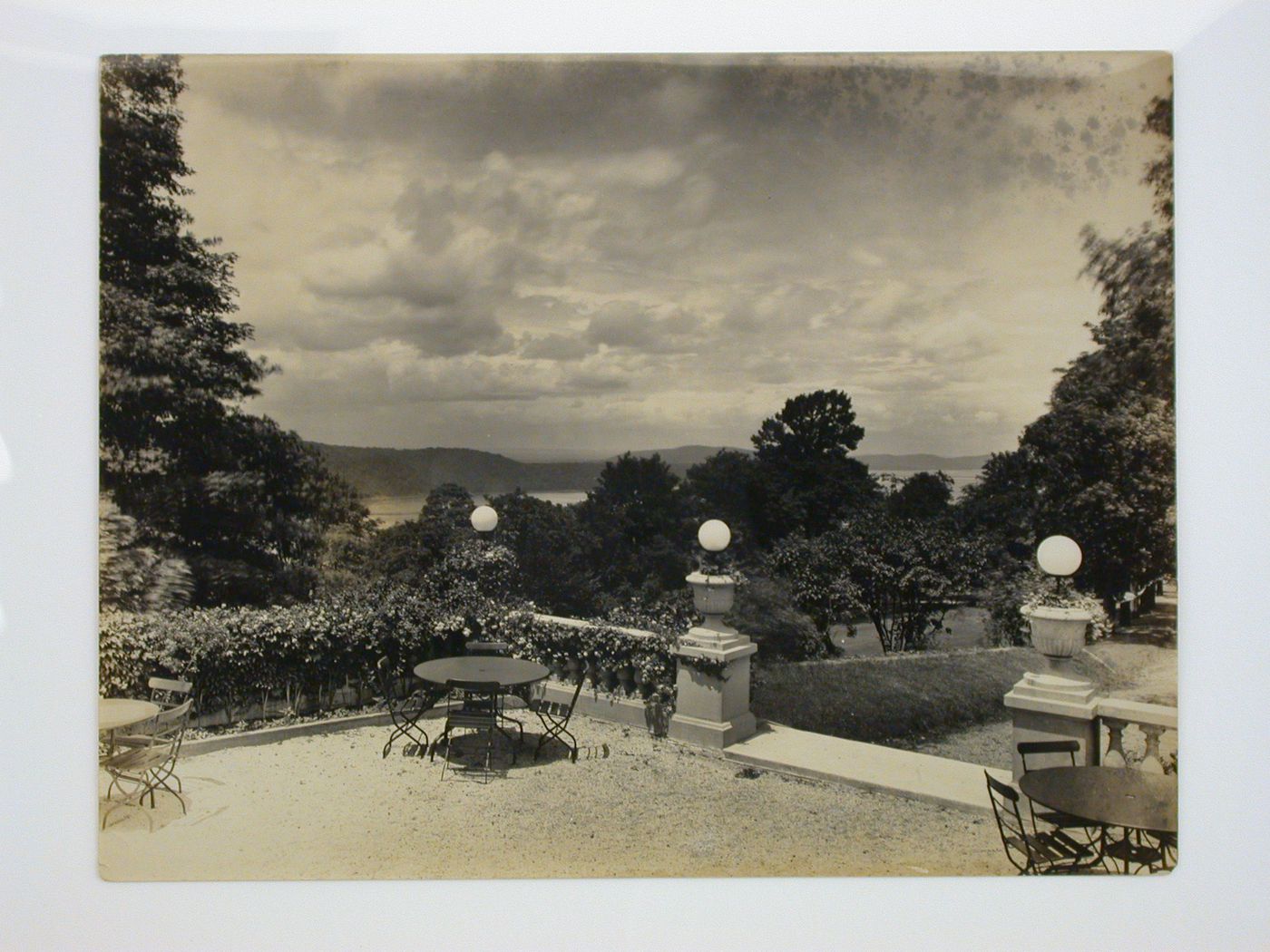 View from the Longue Vue Golf Course clubhouse terrace showing a river and hills in the distance, New York [?], United States