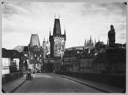 View of the Charles Bridge, church towers in the distance, Prague, Czech Republic