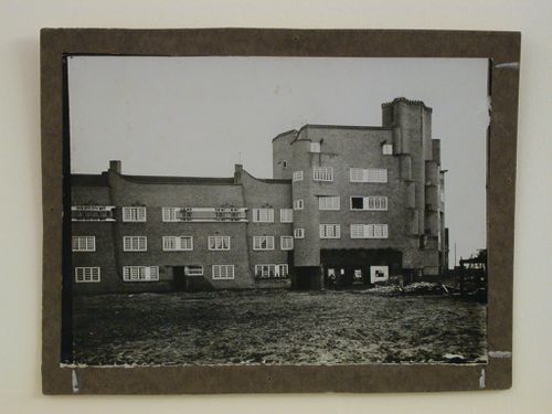 View of the tower and north façade of the East or West Block of De Dageraad [The Dawn] under construction, Amsterdam, Netherlands