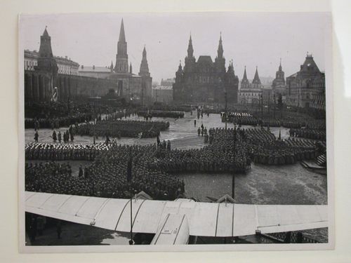 View of Red Square during a May Day parade with the Lenin Mausoleum, Senate, Nikol'skaya and Corner Arsenal Towers, Historical Museum, Voskresenskie Iverskie Gates, monument to Minin and Pozharsky, and Upper Shopping Arcades in the background, Moscow