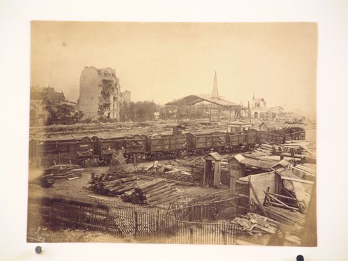 Partial view of a railway station showing other buildings in the background after the Paris Commune uprising of 1871, Paris, France