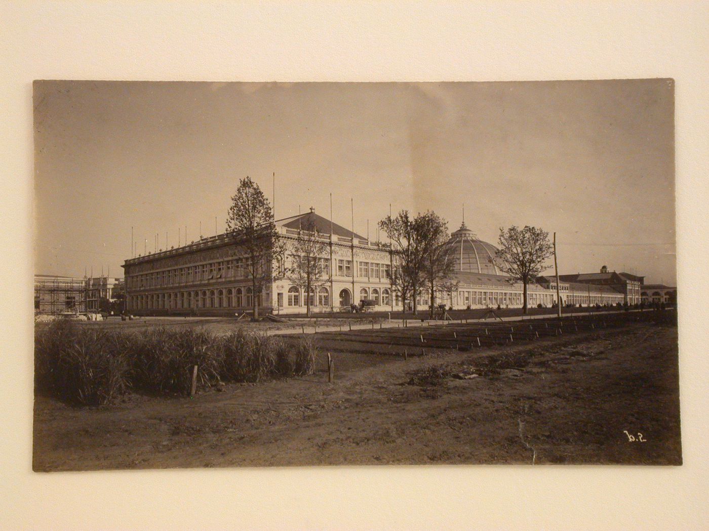 View of the west façade of the Horticultural Building showing a building under construction in the left background, 1893 Chicago World's Columbian Exhibition, Chicago, Illinois