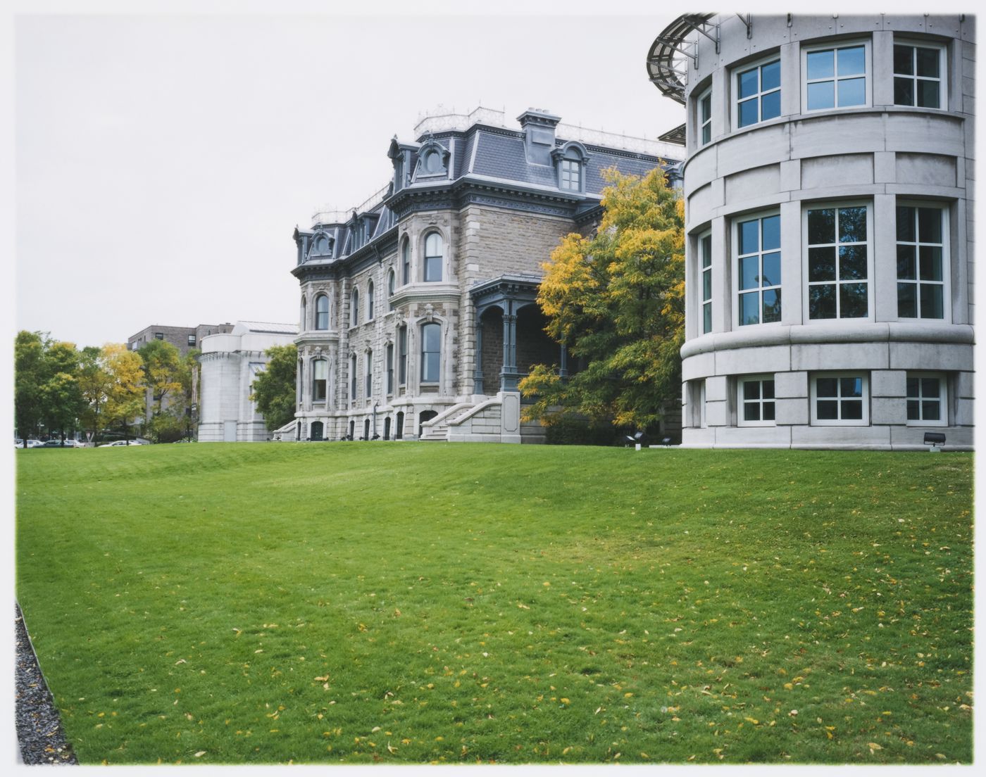 View of the south façade showing the Scholars' Wing, Shaughnessy House and the Paul Desmarais Theatre, Canadian Centre for Architecture

