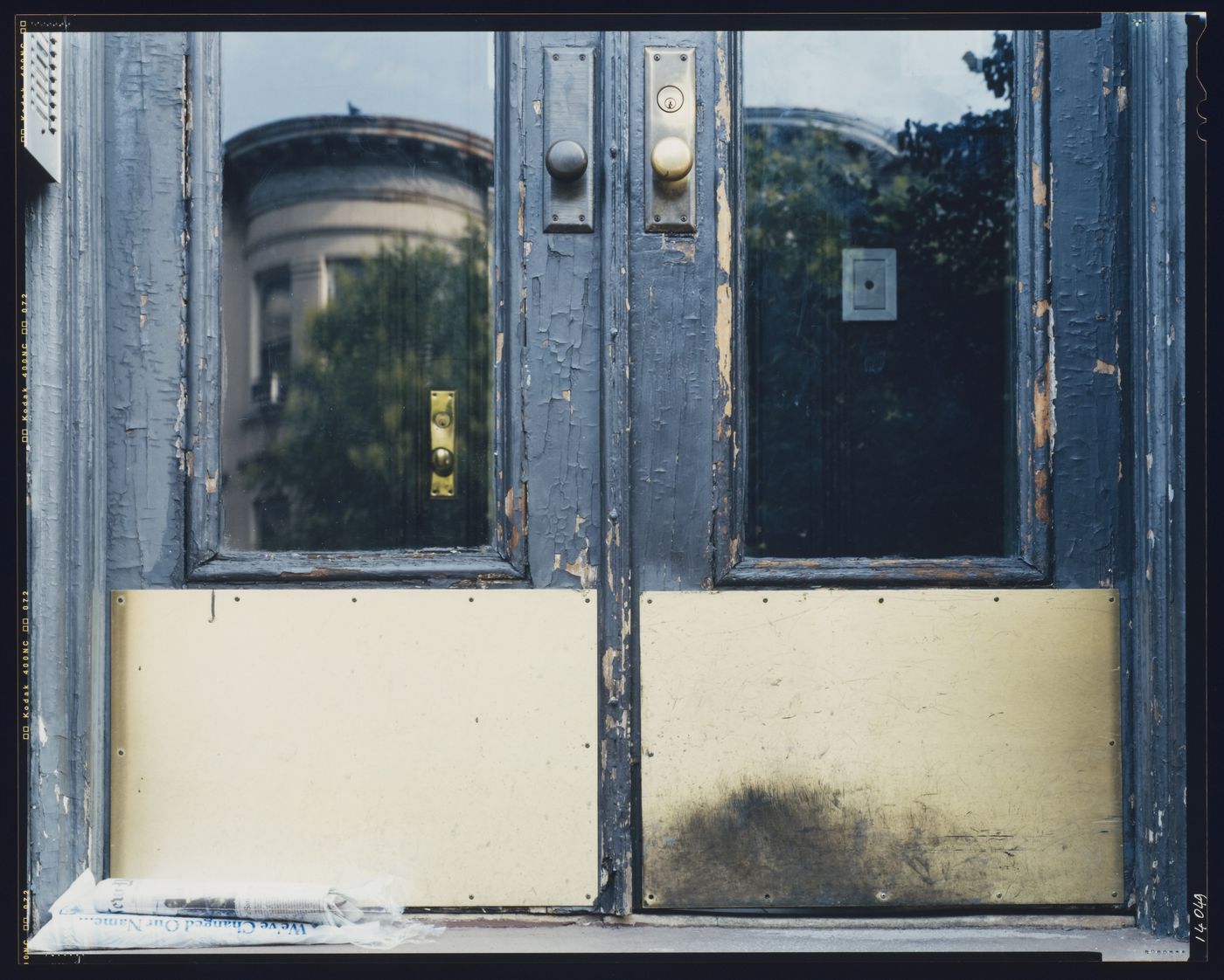 Close-up view of the lower portion of a residential building's double doors, 8th Street, Brooklyn, New York City, New York