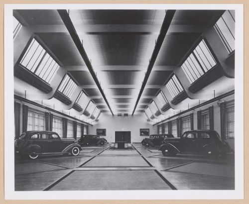 Interior view of automobiles on display in a showroom of the Engineering Building (formerly the Personnel Building), Chrysler Corporation Highland Park Plant, Highland Park, Michigan