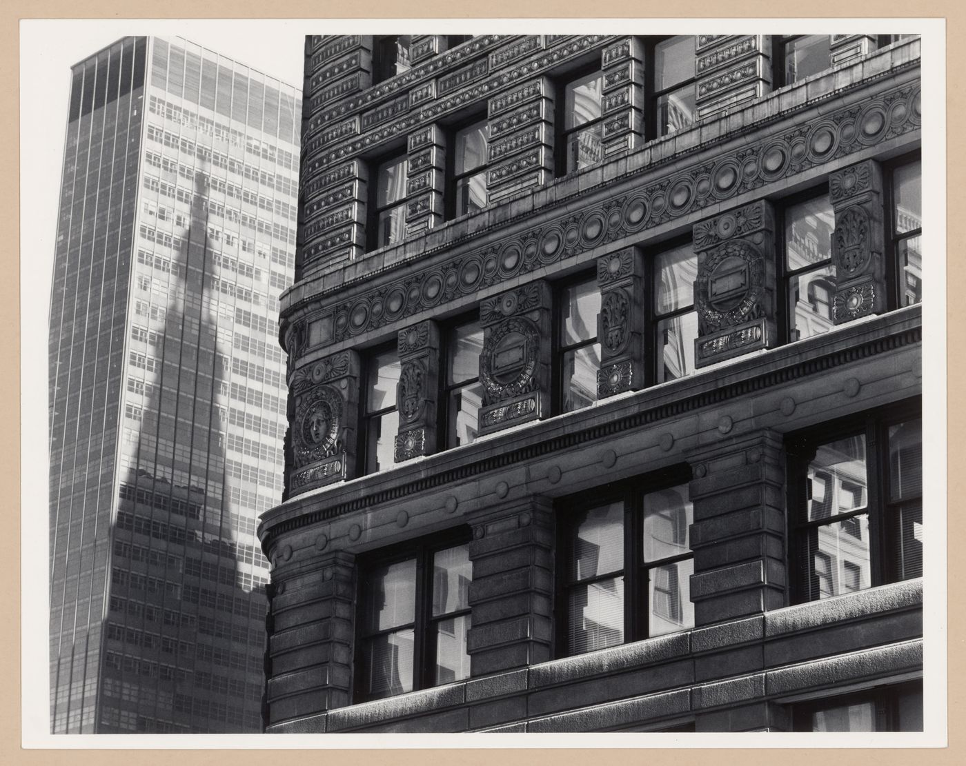 Partial view of the Flatiron building with another building in the left background, New York City, New York