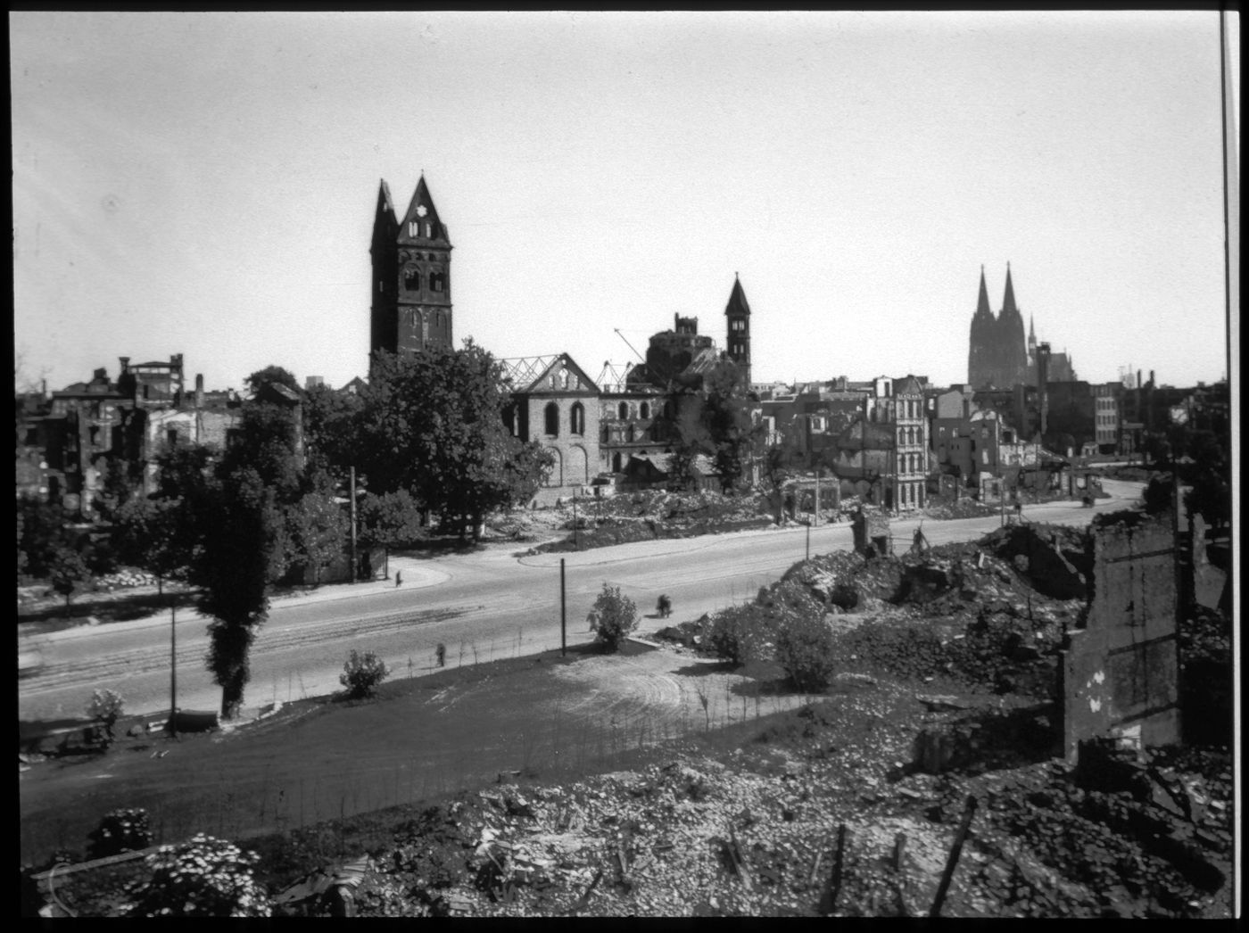 View of street with Basilica of the Holy Apostles, Cologne, Germany
