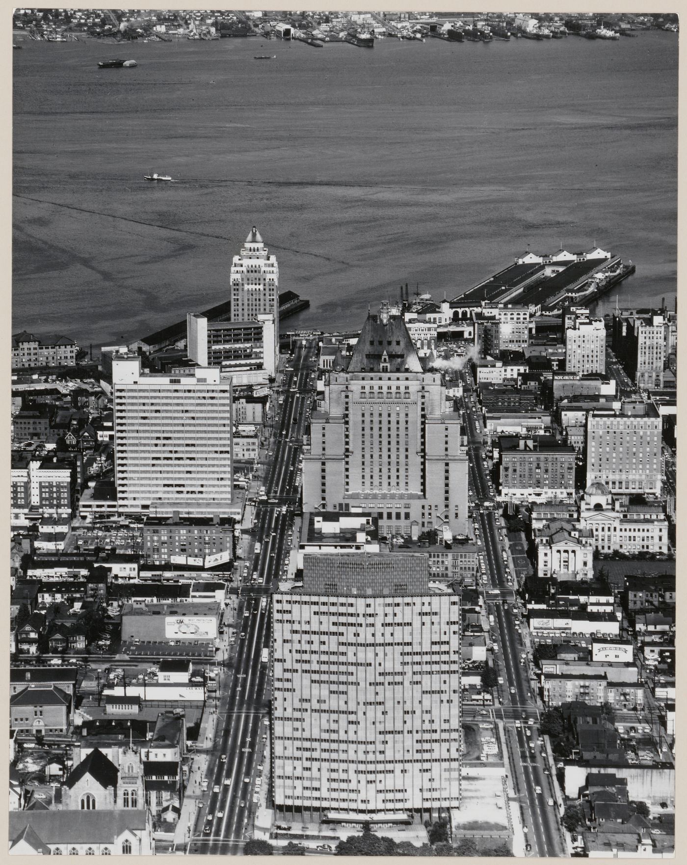 Business area with BC Electric building in foreground, Vancouver, British Columbia