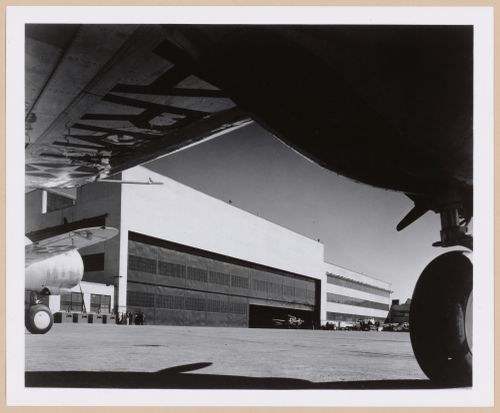 View of the south façade of the Assembly Building from beneath an airplane wing, Curtiss-Wright Corporation Airplane Division St. Louis Assembly Plant, Robertson, Missouri