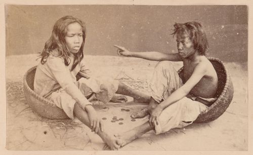 Group portrait of two people, probably in Cochin China (now in Vietnam)