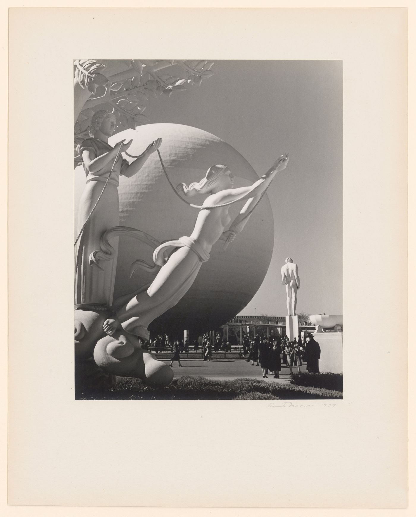 New York World's Fair (1939-1940): Close-up of two statues on the sculptural sundial, "Time and the Fates of Man", Perisphere Theme Center and Statue, "The Astronomer", in background