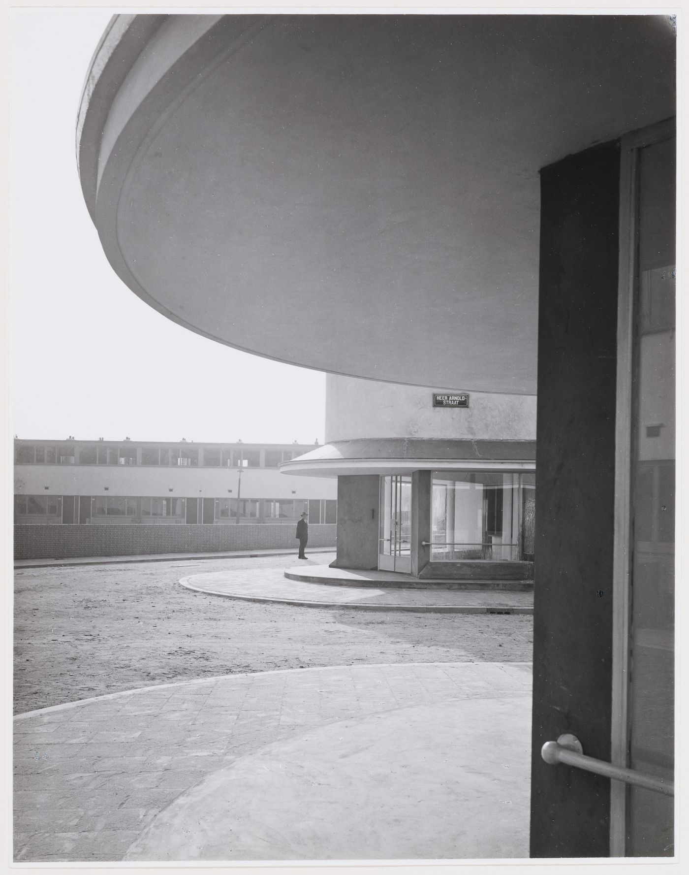 View of the principal façade of Kiefhoek Housing Estate showing a corner store, Rotterdam, Netherlands