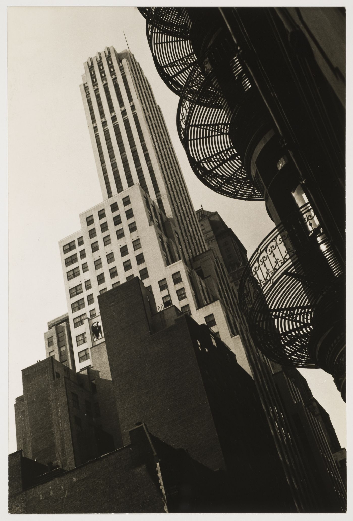 Abstract view of two buildings, one with spiral fire escape, New York City, New York