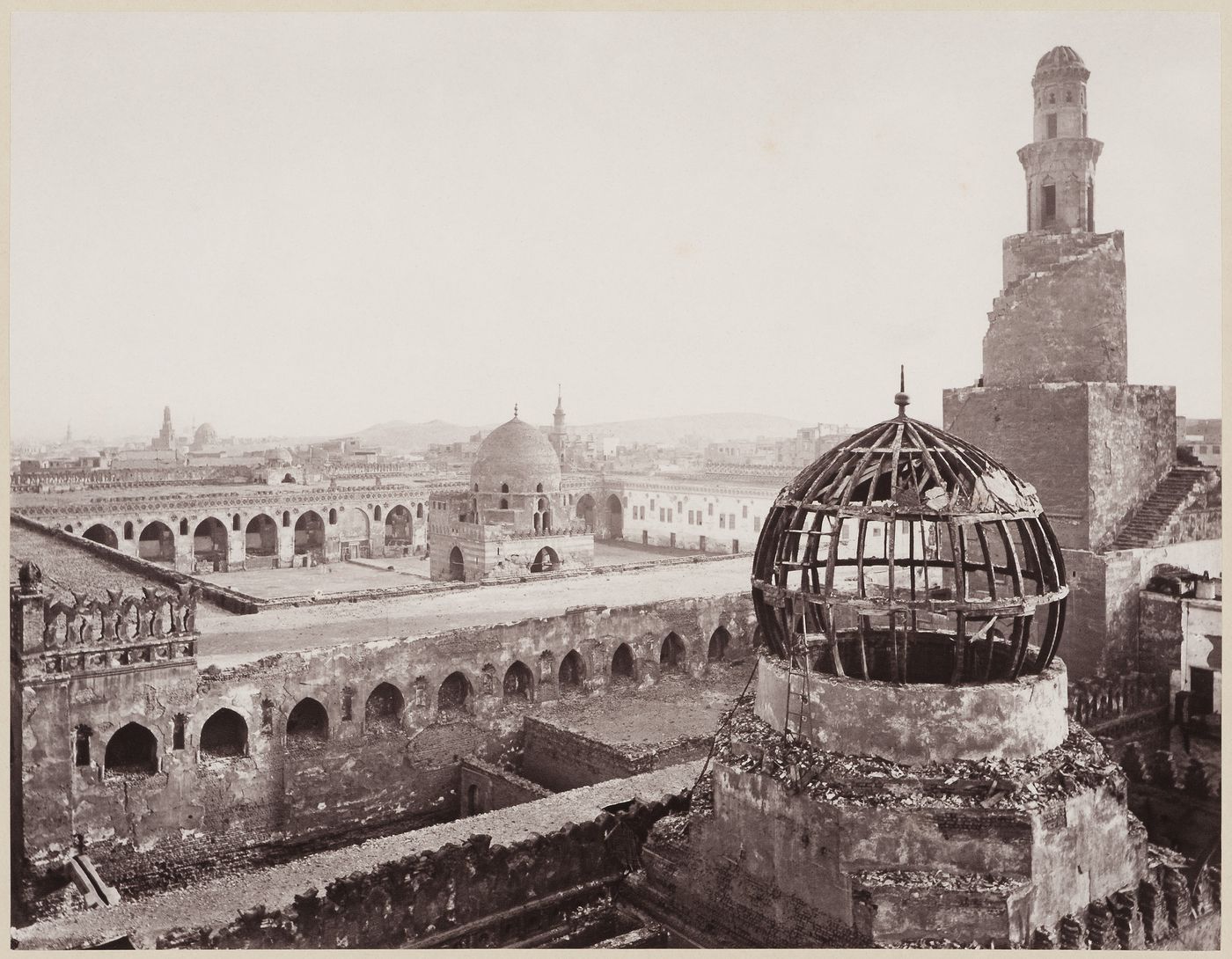 View from minaret of Mosque Sarahatmish, overlooking dome of mosque, Mosque of Ahmad ibn Tulun behind, Cairo, Egypt