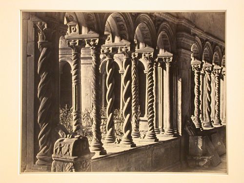 Renaissance portico with carved columns and Romanesque arches, Cloister St. Paul's Outside the Walls, Rome, Italy