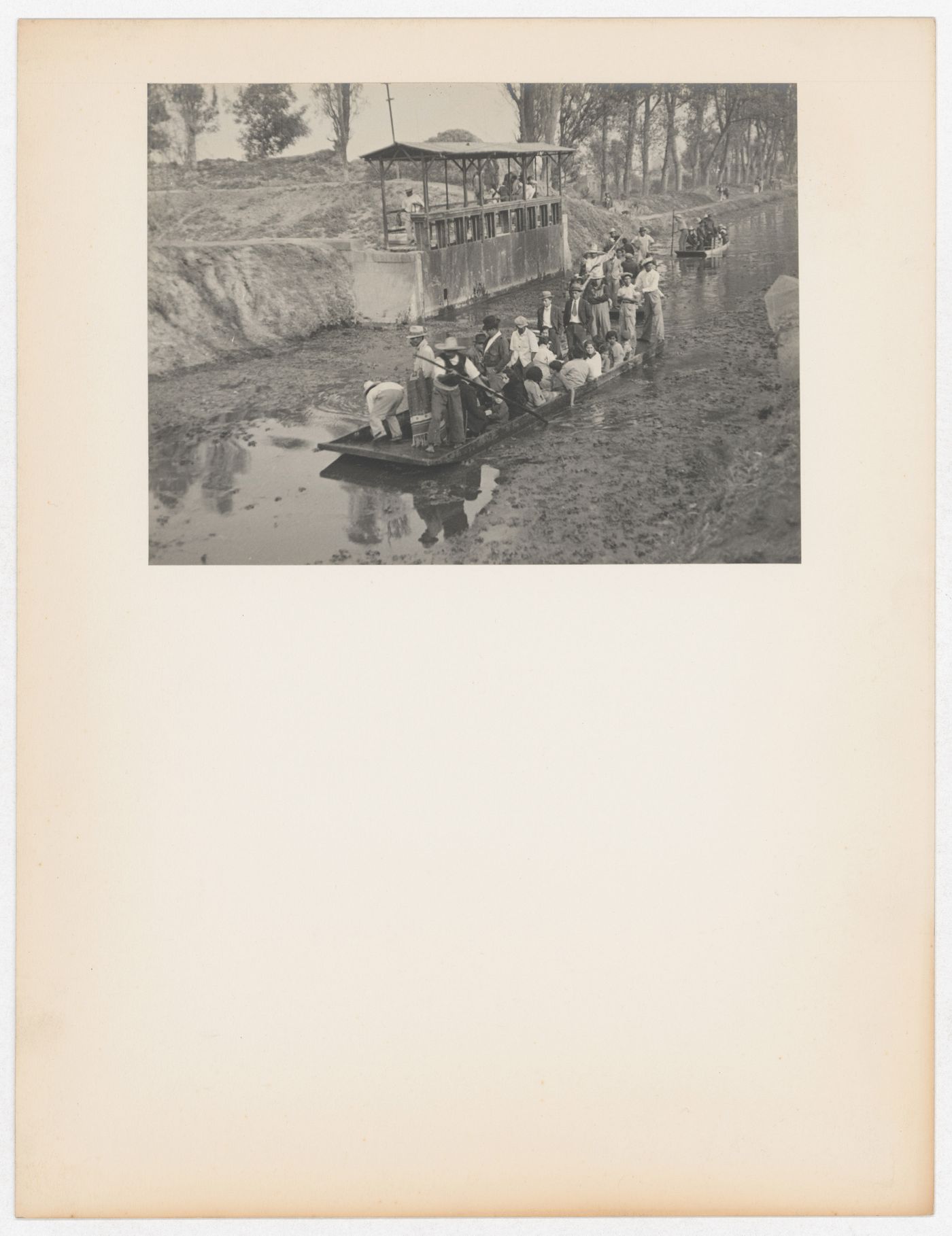 View of people on a riverboat, for the Fiesta - Dia de los Flores [?], Mexico