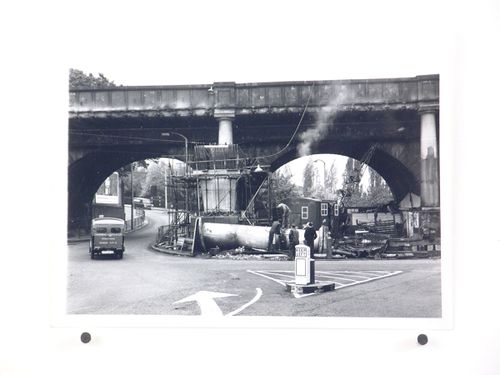 View of breaking up column filled with concrete, Bushey Bridge, England