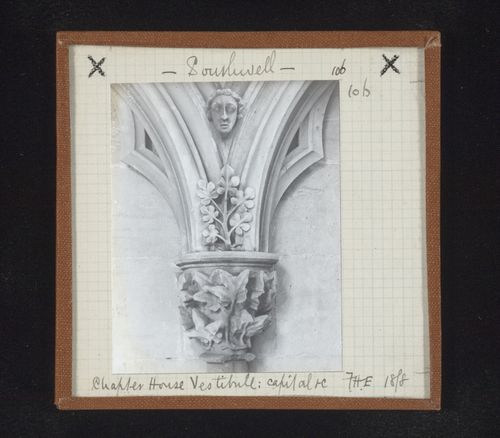 Detail view of blind arcade with capital and sculpture of head in vestibule of Chapter House, Southwell Minster, Southwell, Nottinghamshire, England
