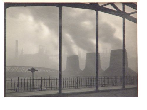 Cooling towers viewed through a bridge and fog, Dortmund, Germany