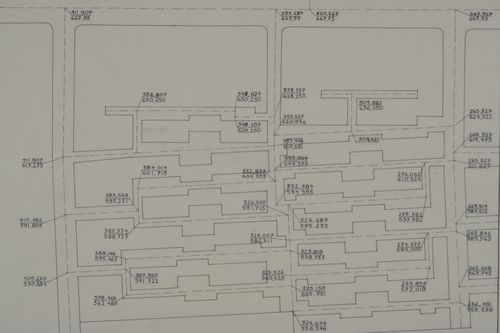 Site plan possibly showing street layout calculations for the Aranya Housing Project, Indore, India