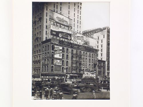 Fifth Avenue and 42nd Street, blurred cars and pedestrians, New York City, New York