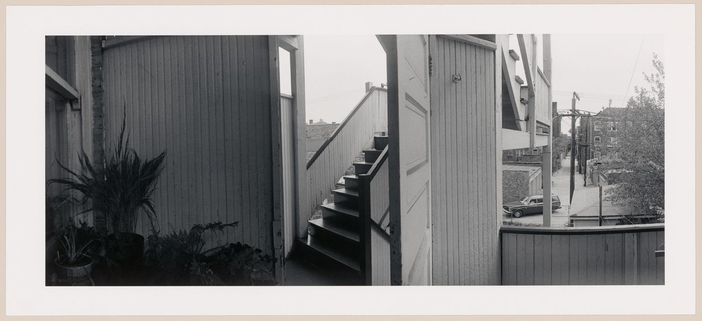 Panoramic view from a balcony showing an exterior staircase of an apartment house, Chicago, Illinois, United States