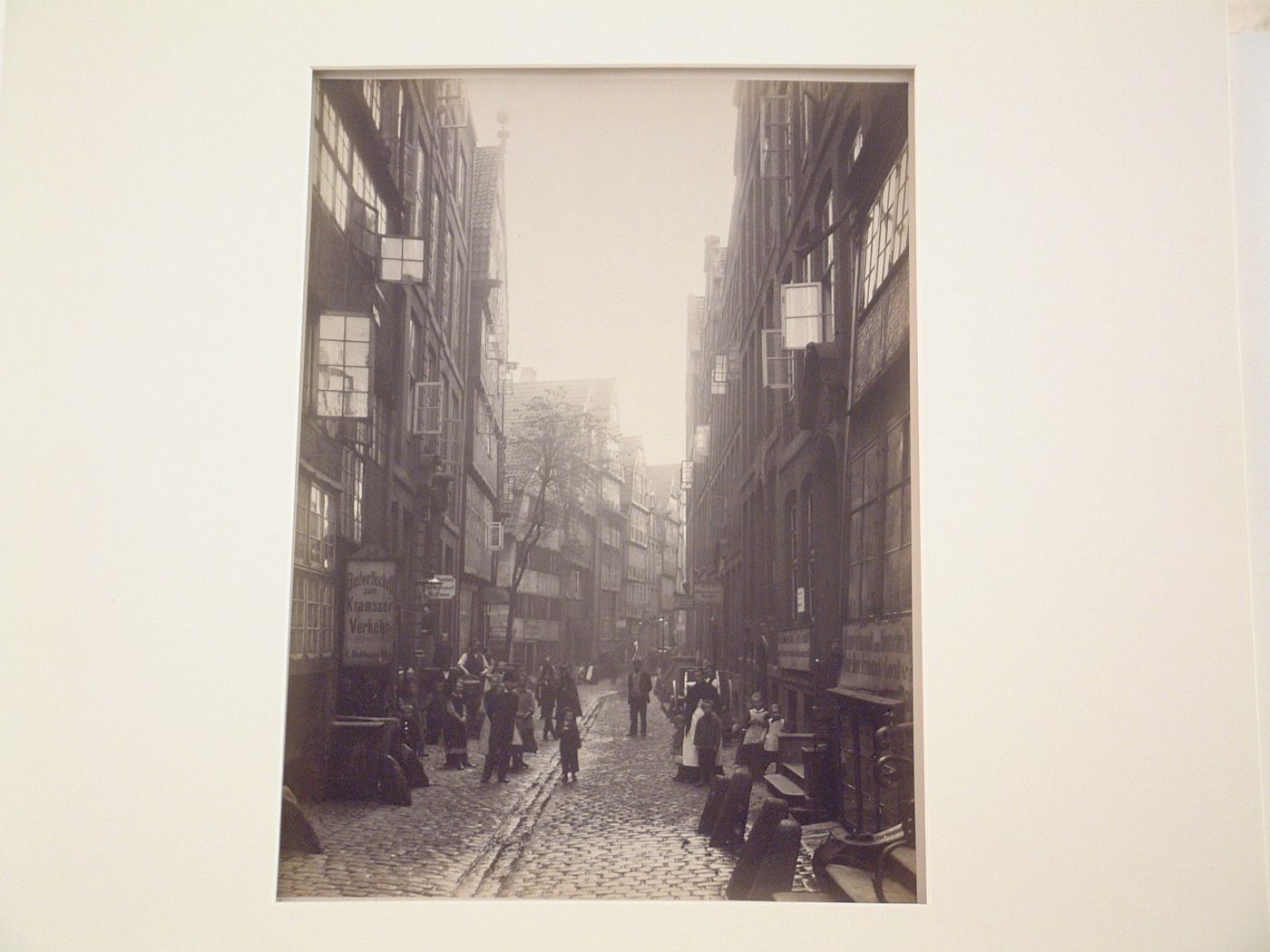 Residential small business street with crowd, Hamburg, Germany