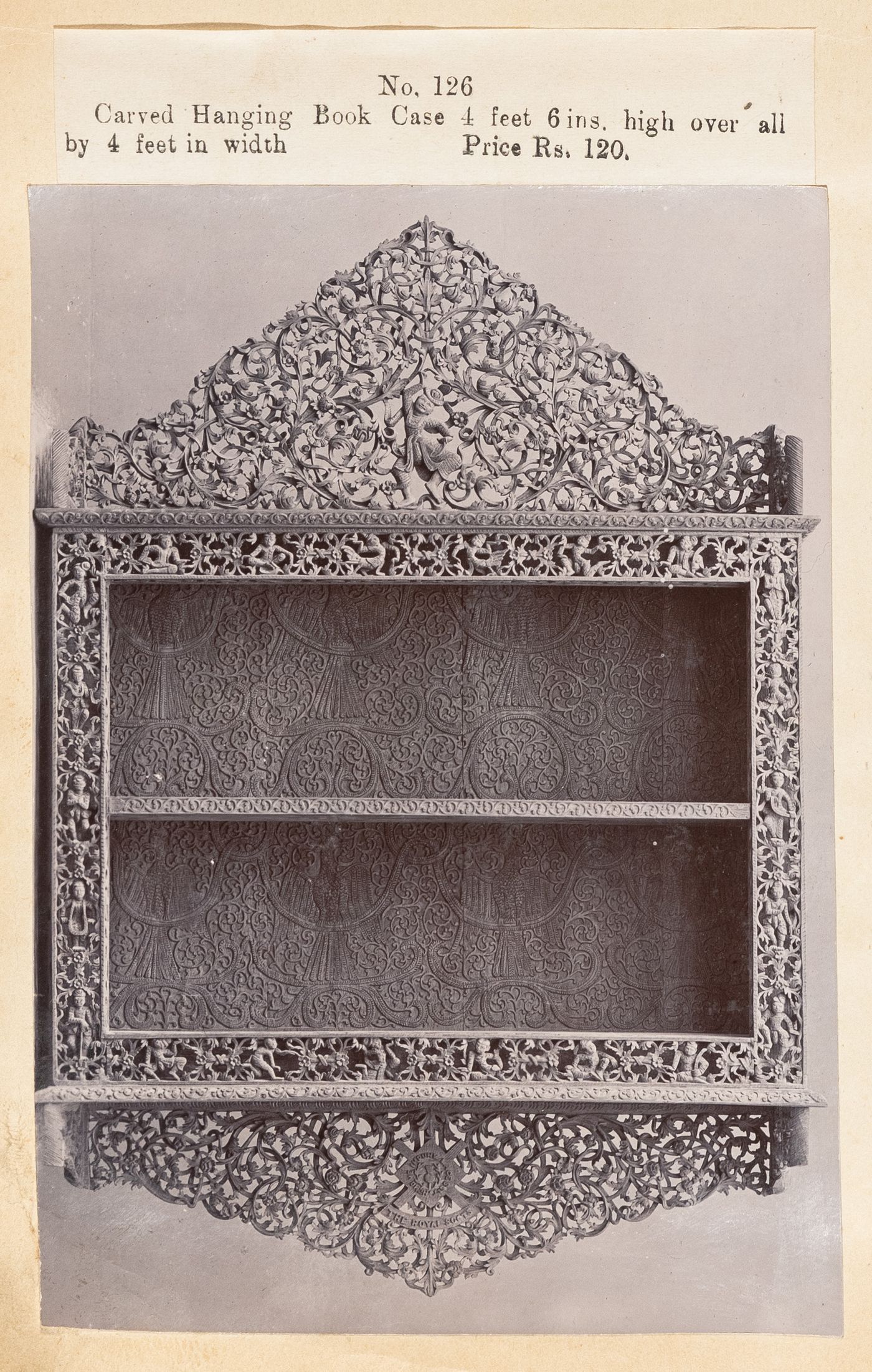 View of a bookshelf, F. Beato Limited, C Road, Mandalay, Burma (now Myanmar)